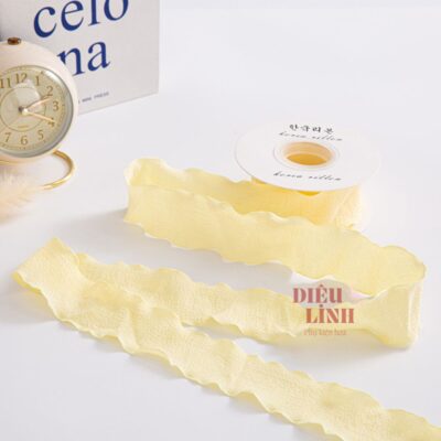 Ruy băng bèo nhún chất xốp màu vàng
